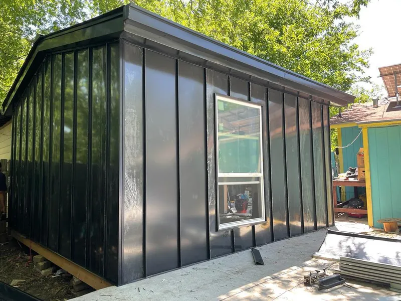 Black standing seam metal wall panels for Roof Inspection in Simsbury