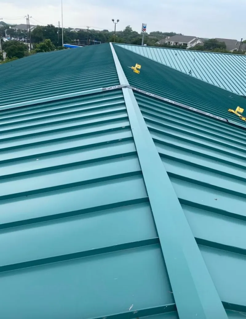 Green commercial metal roof ridge and valley for Metal Roof Repair in Simsbury