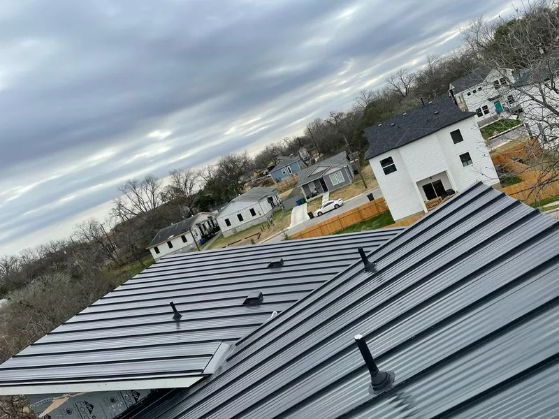 Standing seam metal roof panels with vents for Skylight Repair in Simsbury